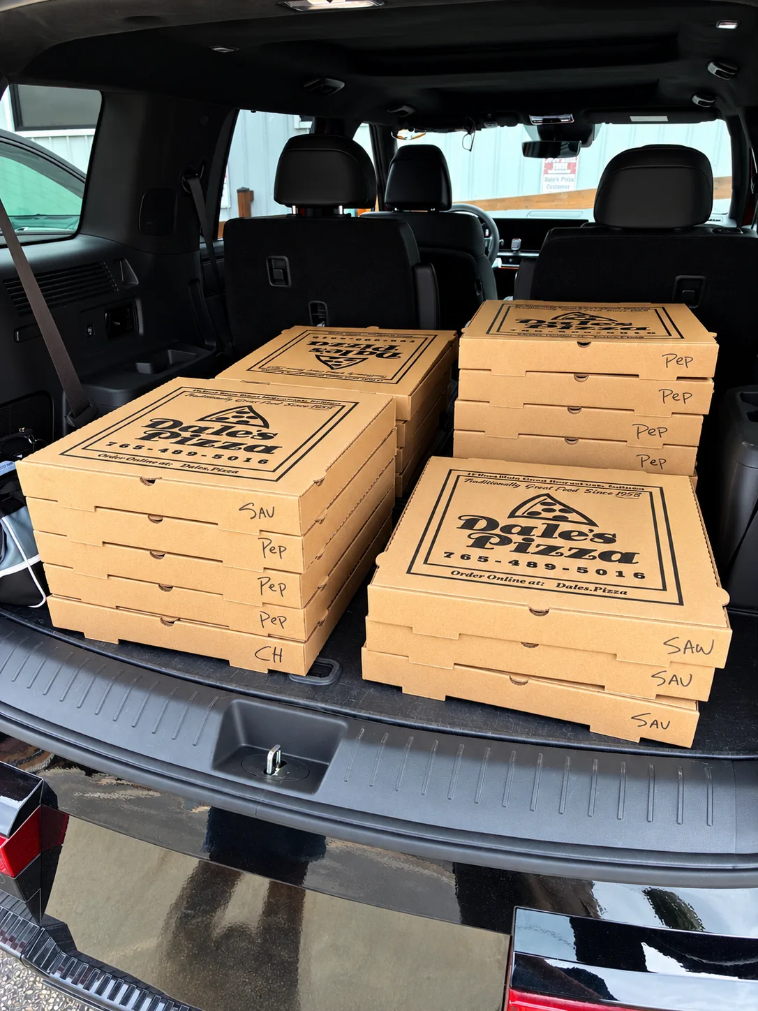 Large Dale's Pizza order ready for an event